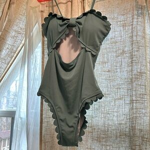 never been worn Pretty sage green one piece suit